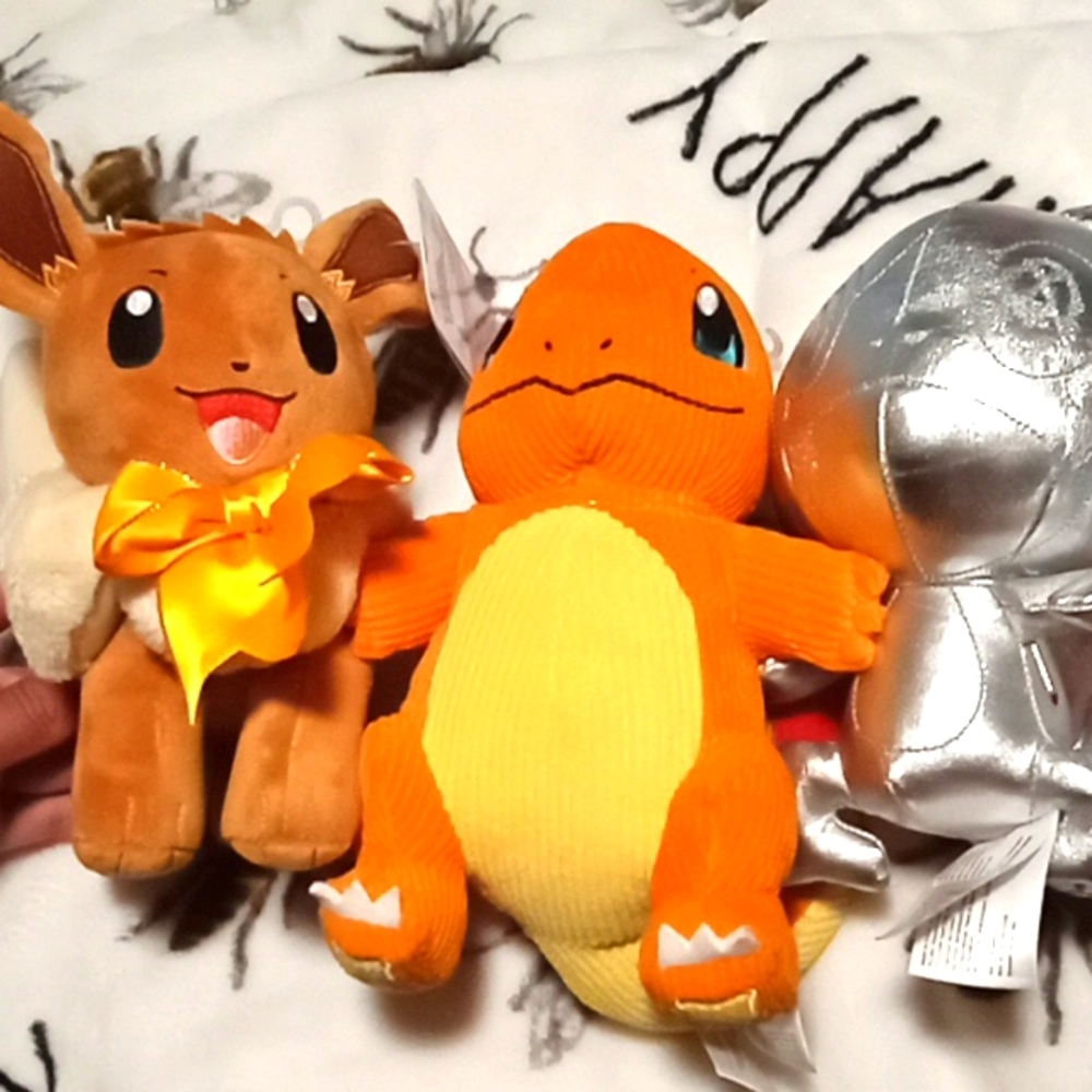 A bundle of three Pokemon plush's all 8 inches big new in used
